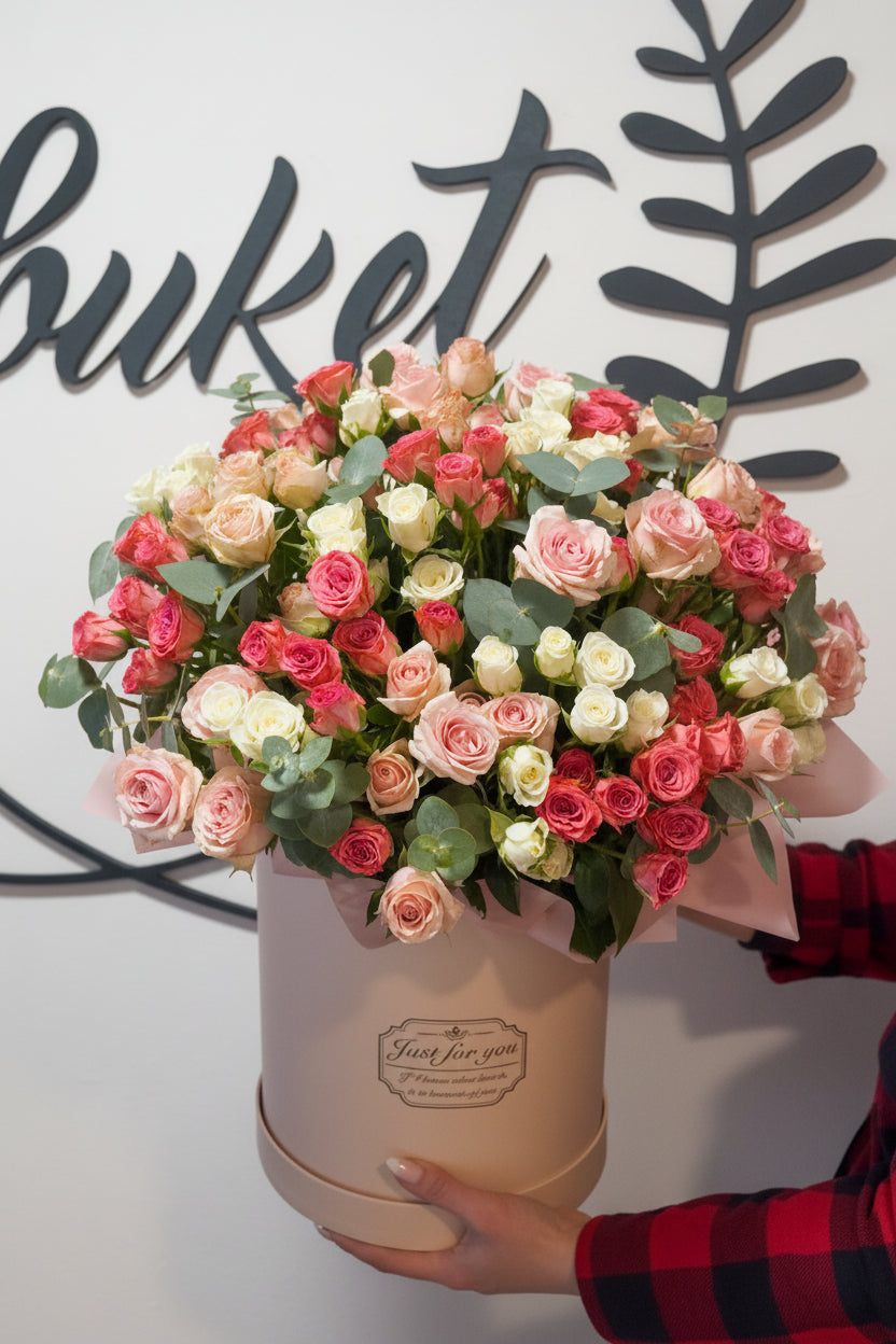 100 soft pink roses bouquet in white wrap